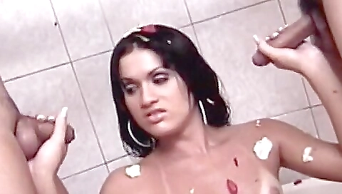 Busty latina shemale fucked hard on the bed by two dicks