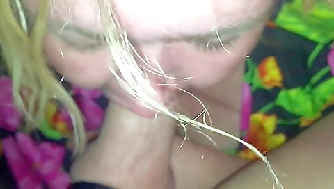 Blonde chick sucks a large white cock in deep throat