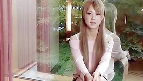 Asian transsexual gets on her knees to enjoy her pussy