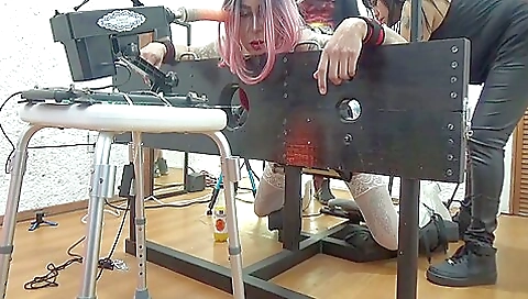 Handsome dude uses a vibrator to fuck himself in bondage