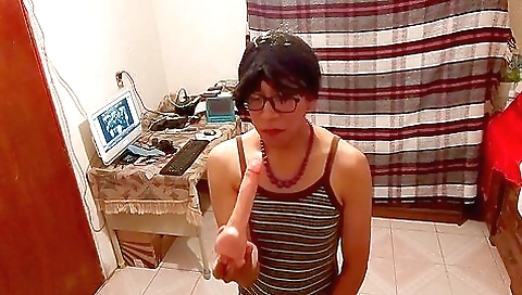 Hot brunette and a big dildo playing with her body