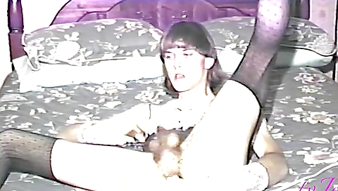 Barebacked amateur brunette in sexy lingerie and stockings