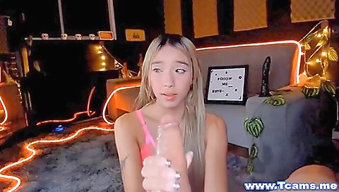 Blonde pornstar enjoys a deepthroat blowjob and a handjob