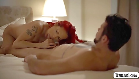 Busty redhead gets fucked in the back after a deepthroating