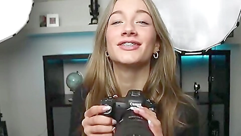 Sexy brunette in a sexy pink dress and black stockings