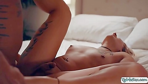 Blonde teen with a nice tattoo takes a big hard cock and fucks